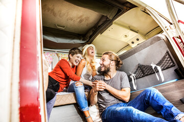 Carefree friends inside a van