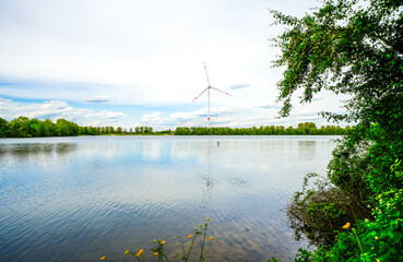 View of the Menzelen leisure lake in Alpen on the Lower Rhine. Landscape by the lake with the...