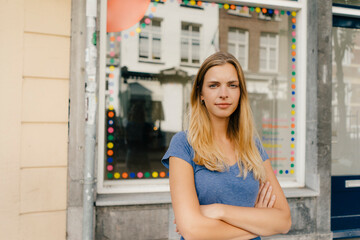 Netherlands, Maastricht, portrait of blond young woman in the city
