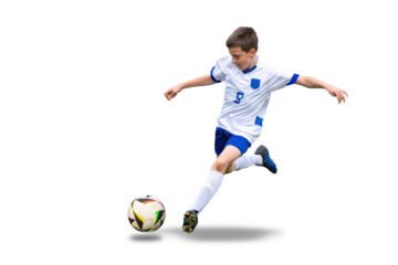 Isolated, transparent young boy kicks a soccer ball