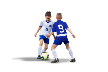Isolated, transparent young football player skillfully dribbles past an opponent in a match between youthful teams