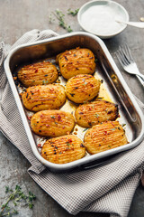 Baked Hasselback poataoes in baking tray