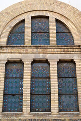 Obraz premium Big colorful stained glass window on the facade of the Synagogue of Novi Sad, seen from outside, Novi Sad, Serbia