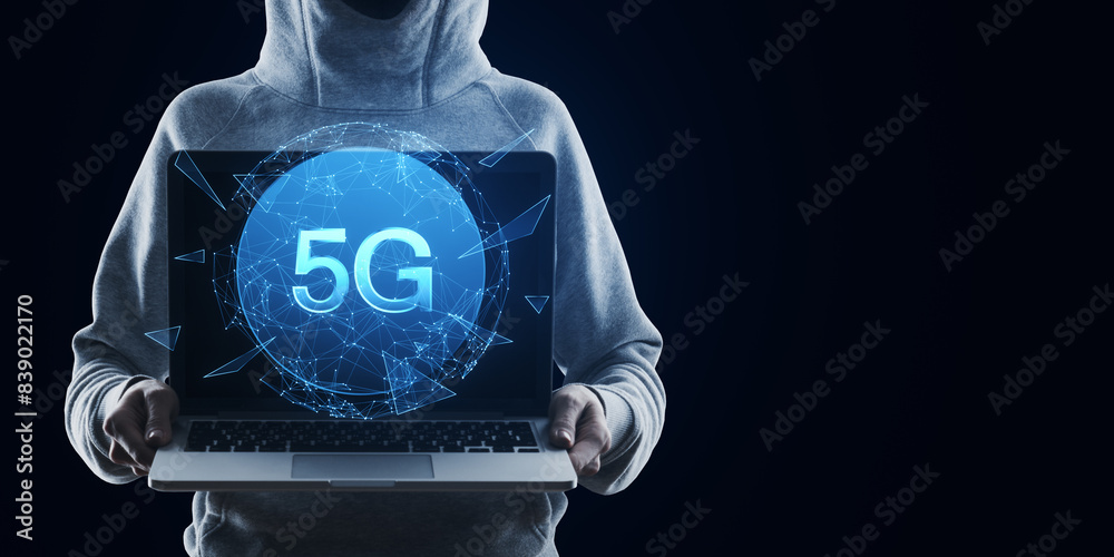 Poster Hacker holding laptop with creative polygonal globe with 5g internet hologram on dark background with mock up place. Technology, data and future and mobile internet concept.
