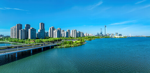 Modern city building skyline and lake scenery in Suzhou