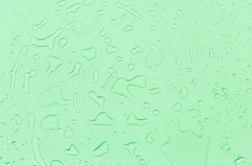 Abstract water drops on green background, green water drops pattern background