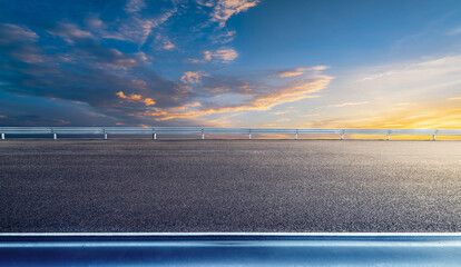 Empty asphalt road and sky clouds background
