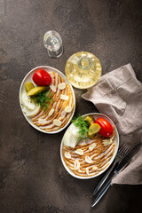 top view of two plates with lard and mustard pickled vegetables food