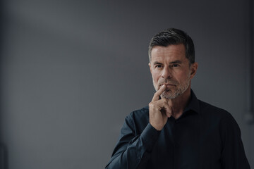 Portrait of serious mature businessman