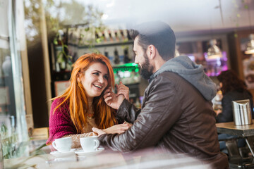 Couple in love in a coffee shop