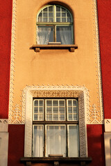 Two windows on the facade of the city hall, town hall of Subotica, an example of Art Nouveau...