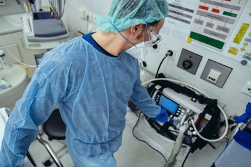 Doctor in emergency room of a hospital with respiratory equipment