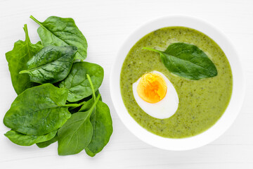 Green soup. Broccoli spinach cream soup in a bowl.