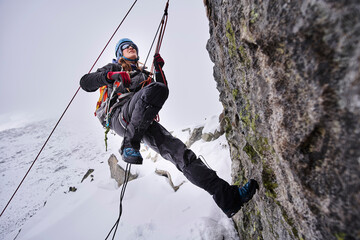 Mature woman climbing at Grossvendediger, Tyrol, Austria