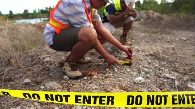 Footage 4K: Geologist working at mine exploration site