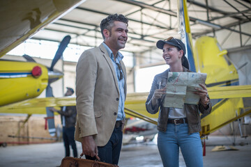 Female pilot talking to business client