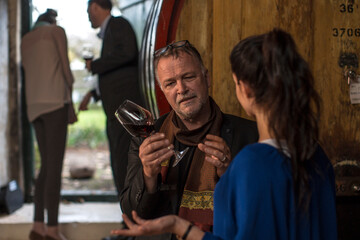 People at a wine tasting at wine estate