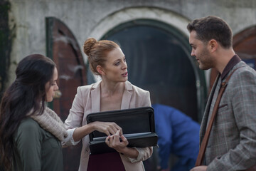 Business people visiting distillery