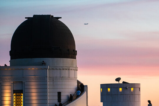 observatory dome with sunset in background