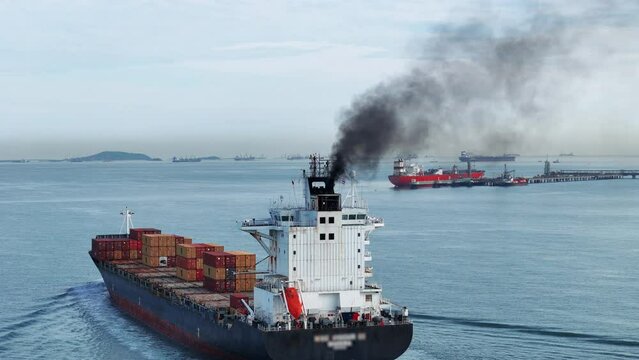 Smoke exhaust gas emissions carbon dioxide from cargo lagre ship container ship,Marine diesel engine exhaust gas from combustion, Gas Emission Air Pollution from transportation. green house effect Eco
