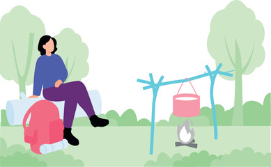 The girl is cooking on the bonfire.