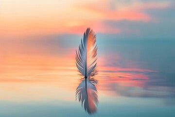 A feather standing upright on a calm reflective surface during sunset, creating a serene and tranquil atmosphere with soft pastel colors.