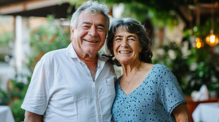 Obraz premium Happy active senior couple having fun outdoors. Portrait of an elderly couple together