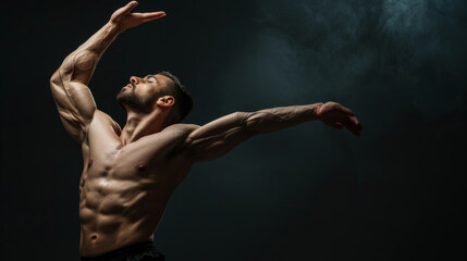 A skilled dancer showcases their muscular physique and graceful movement against a dark, dramatic...