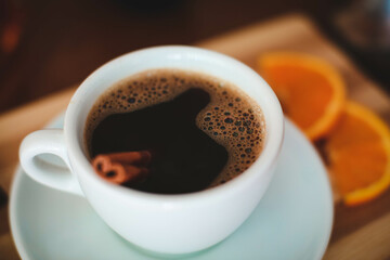 Fototapeta premium Black coffee with orange. coffee house