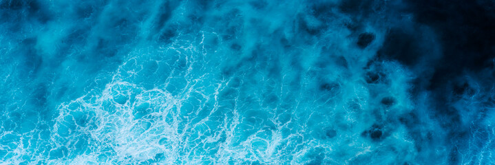 Banner Turquoise ocean sea water white wave pattern splashing deep blue sea. Banner Tropical sea...