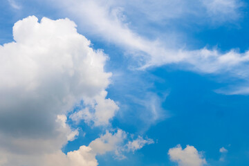 Tropical summer blue sky fluffy white cloud summertime on light sunny day cloudscape. Clear bright blue skyline spring sunlight climate background. Heaven blue environment ecology high scenic nature.