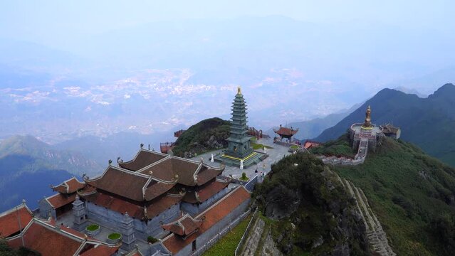 Beautiful view from Fansipan mountain with a Buddhistic temple. Sa Pa, Lao Cai Province, Vietnam. Travel and landscape concept