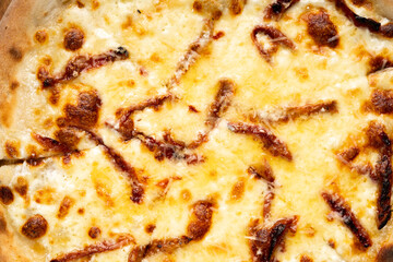 Close-up of Very cheesy pizza slice .Pizza dish of Italian origin