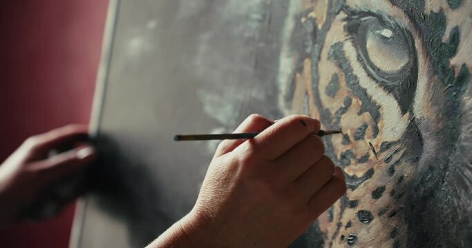 Woman Painting Picture of a Tiger