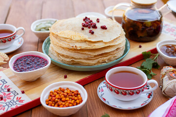 pancakes. thin pancakes or pancakes on a plate. pancakes with berries. Maslenitsa