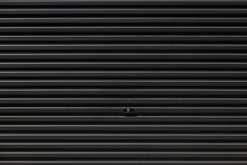 A black shutter door background and texture.