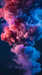 Obraz premium Close up of pink and blue ink smoke in water, on a black background, in the style of hyper realistic photography