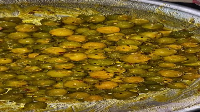 Cordia myxa pickle close up. It is also called as lasoora achaar. Traditional food of india and pakistan.