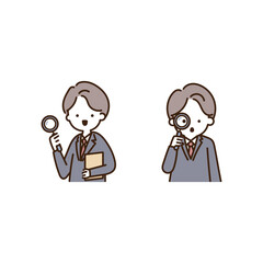 虫眼鏡を使ってよく確認するスーツ姿のビジネスマン