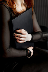 A girl with a laptop in her hands, close-up