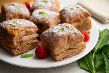 Miguelitos are typical pastries from Spain made from puff pastry, filled with chocolate cream and sprinkled with sugar.