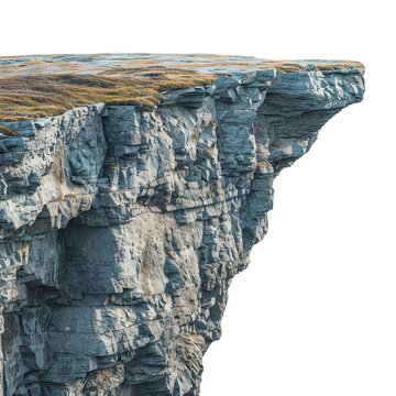 Stunning cliff edge with rugged rock formations and a grassy top, perfect for nature and landscape photography.