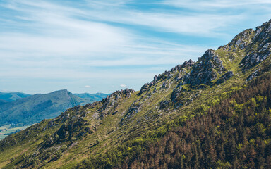 Naklejka premium Train de la Rhune is an authentic almost century-old collectible cogwheel train taking you to the most legendary summit of the Basque Country, a magnificent panorama of the Coast & the Basque Country