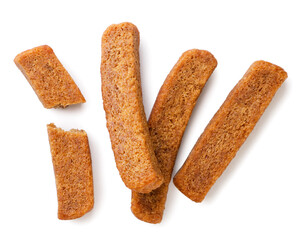 Rye croutons and pieces on a white background. Top view