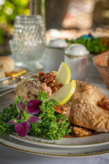 Roasted duck, partially boned, filled with bread stuffing and served with tangy sweet seasonal fruit sauce.