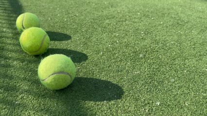  tennis ball back light shadow on tennis grass court good for background