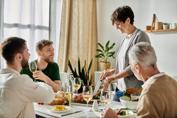 A gay couple enjoys dinner with parents at home.