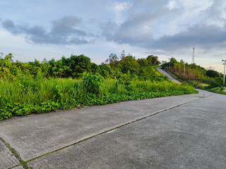 rural roads paved with hills. the road is uphill
