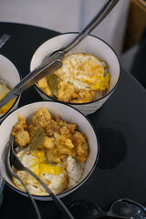 food menu of crispy chicken rice and fried egg rice in a bowl