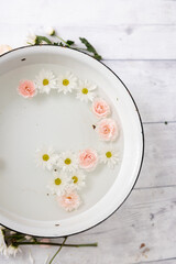 flower in milk bath with lots of petals